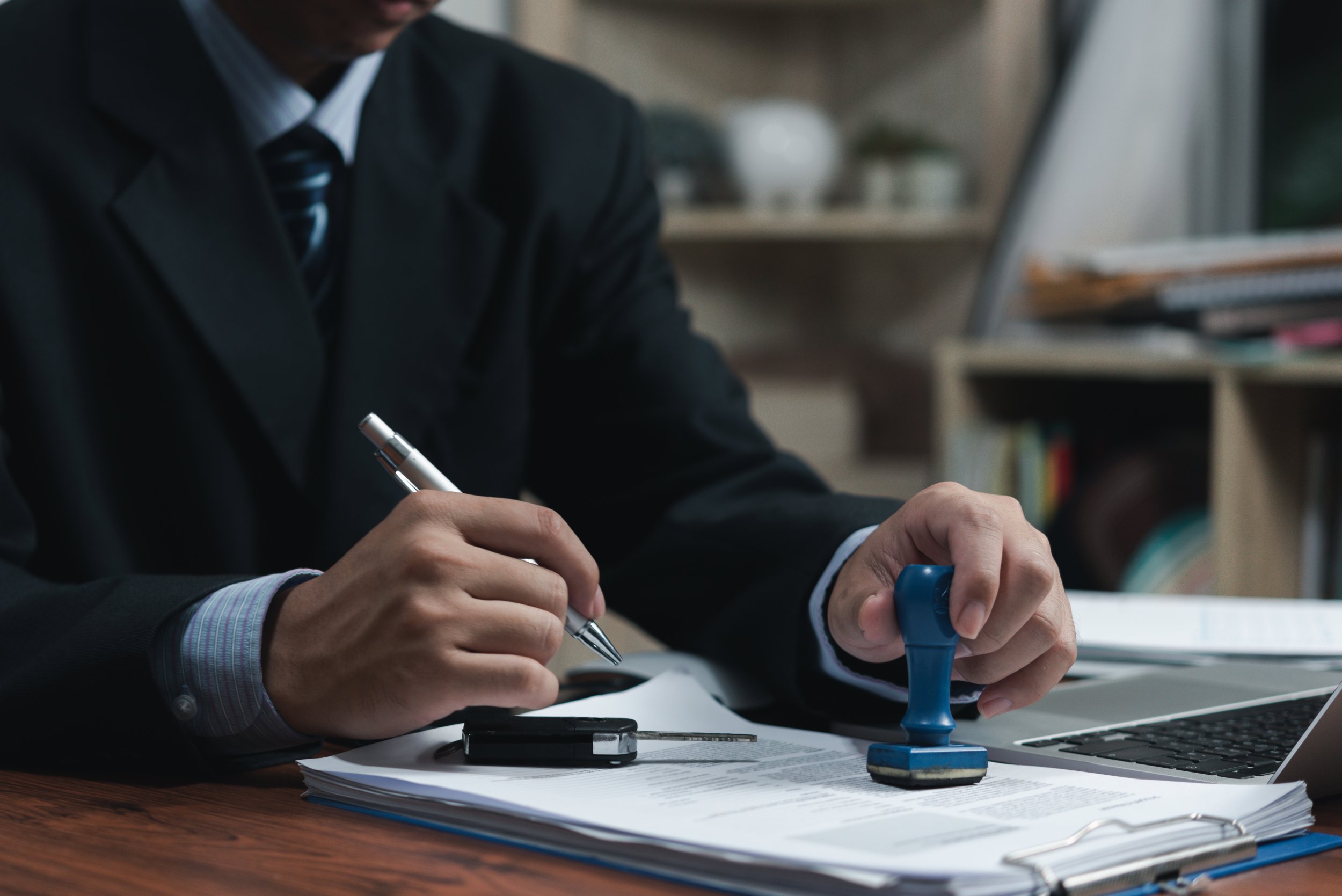 A document being signed at an appointment